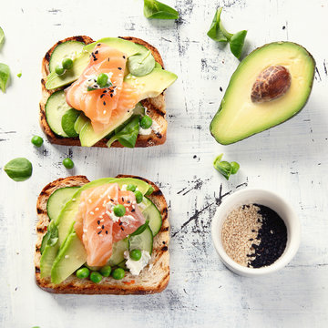 Toast With Avocado, Cucumber And  Salmon