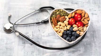 Healthy snack in heart shaped bowl