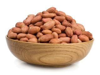 Peanuts in a wooden Cup isolated on white background