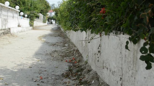 old and dirty small alley beetwen houses