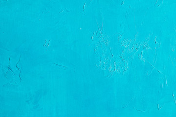 cyan scratched background. distressed blue stucco plaster texture decor. free space concept
