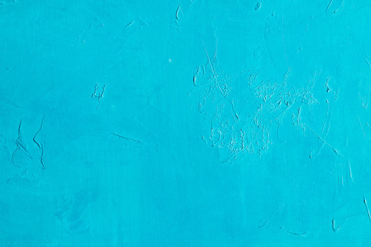 cyan scratched background. distressed blue stucco plaster texture decor. free space concept