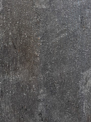 Fototapeta premium abstract distressed decor background. asphalt texture dark grey scratched plaster design. free space concept