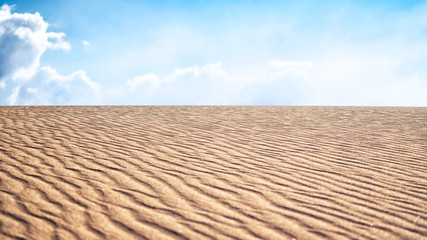 desert sand pattern flat horizon blue sky