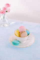 Delicious french dessert. Colorful pastel cake macaron or macaroon