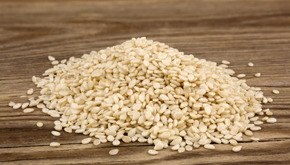 White sesame  on wooden background