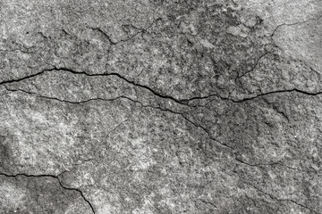 texture of old asphalt with cracks, background