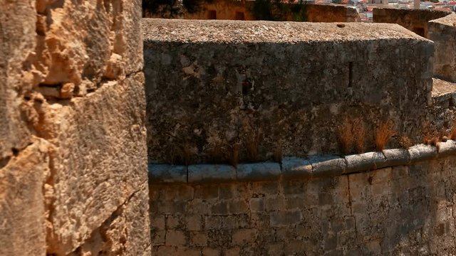 Establishing shot of the coastal town of Rethymno, Crete, Greece including the famous Venetian fortress