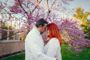 Fototapeta premium elegant family in a park