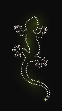 Lizard of beautiful gems on dark background