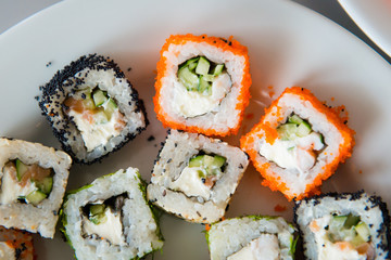 Sushi in a plate top view close up . Japanese cuisine.