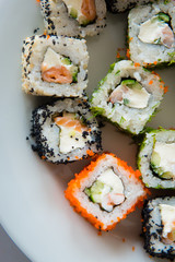 Sushi in a plate top view close up . Japanese cuisine.