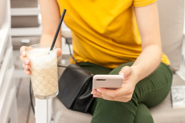 female hands with mobile phone