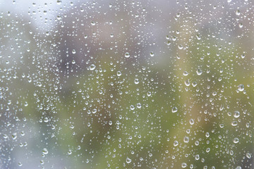Rain drops on window glasses surface