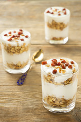 Granola in glasses with yoghurt and pomegranate