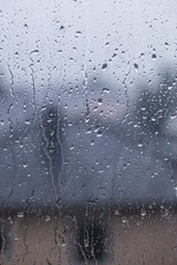 rainy days, rain drops on the window surface 