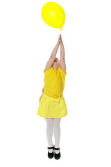 Little girl with balloons.