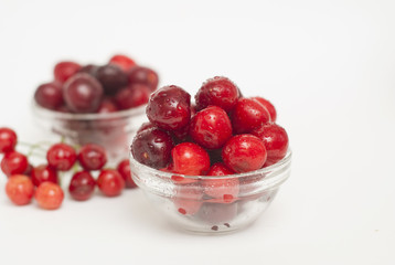 Cherries. Cherry. Cherries in color bowl and kitchen napkin. Red cherry. Fresh cherries. Cherry on white background. healthy food concept