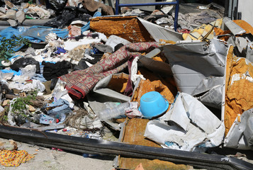 landfill with many broken objects