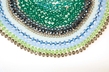 Colorful Shinny Crystal Beads Glass Isoalted on White Background Copy space Hobby Handmade Fashion Beauty