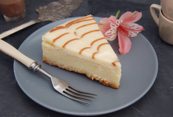 Cheese Cake with Caramel Sauce Isolated Caramel Sauce over Brown Paper with Spoon Sweet Sugar Dessert