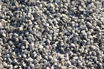 Stone crushed stone on the construction site as an abstract background