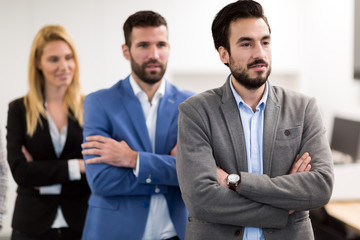 Portrait of business team posing in office