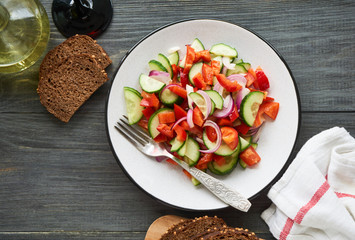 Vegetable salad with bell peppers and cucumbers       