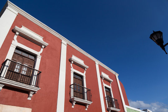 Colorful Empty Colonial Street In The Historic Center Of Campeche. Facade Of A House With A Colored Wall