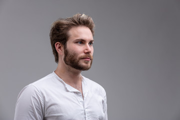 Fototapeta premium Intense young man staring straight ahead