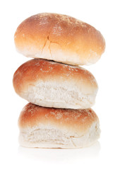 A stack of breakfast rolls isolated on a white background