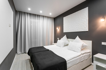 Hotel standart room. modern bedroom with white pillows. simple and stylish interior. interior...