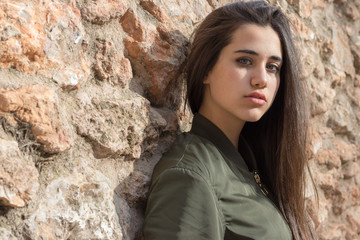 young woman with military green jacket