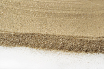 Fototapeta na wymiar Beach sand on white