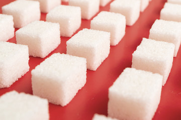 lump sugar on a red background
