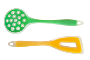 Kitchen colorful utensils isolated on white background.