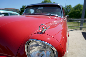These are pictures of very old cars in very good condition, taken at a public exhibition

