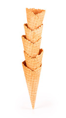 Crispy cone wafers on a white background.