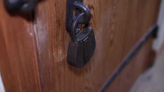 Old historical iron padlock and hasp