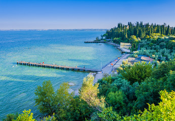 Scenic view of Sirmione beach, a charming little town located on the shores of Lake Garda, nothern Italy
