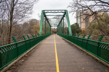 Deserted Bridge for Pedestrains and Cyclists on an Overcast Autumn Day. London, ON, Canada.