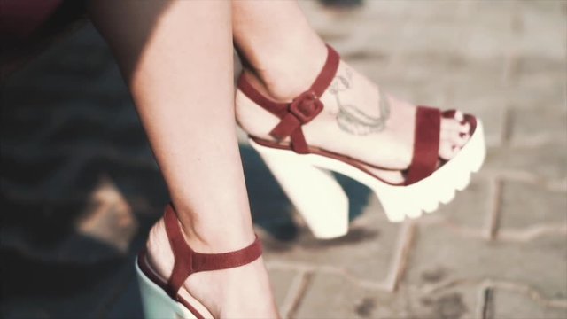 shoes worn by female legs