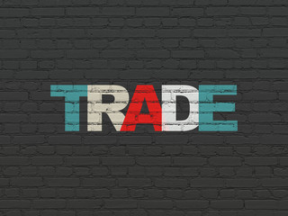 Finance concept: Painted multicolor text Trade on Black Brick wall background