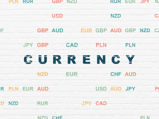 Currency concept: Painted blue text Currency on White Brick wall background with Currency