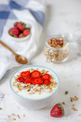 Granola with yogurt and strawberry, healthy breakfast