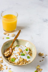 Granola with candied fruits and yogurt, healthy food