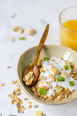 Granola with candied fruits and yogurt, healthy food