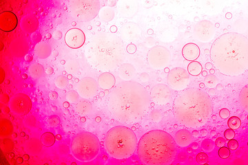 smooth transition from light to shadows with bubbles of oil on water