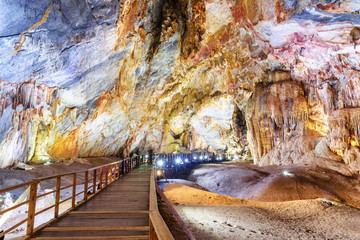 Wooden walkway through wonderful natural corridor, Paradise Cave