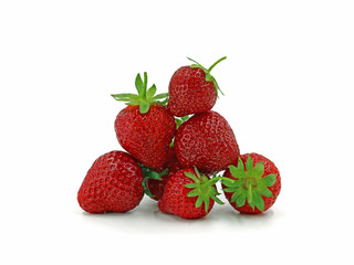 Close up of fresh strawberries shaped to a pyramid isolated on white background
